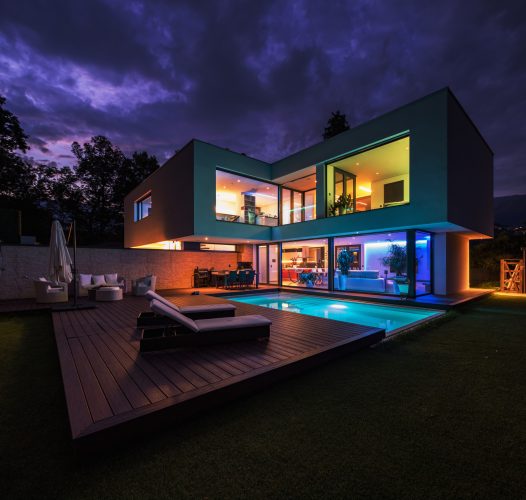 Modern villa with colored led lights at night Modern villa with colored led lights at night. Nobody inside